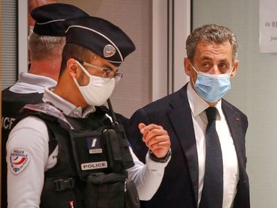 A French court of appeals confirmed former President Nicolas Sarkozy's three-year jail term for corruption and influence peddling