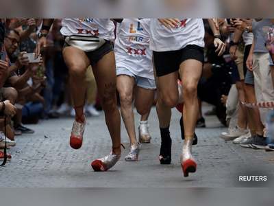 Runners sprint in heels at Madrid Pride celebrations